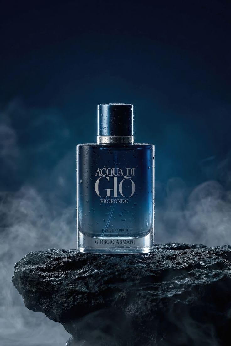 A reed diffuser releasing scent into a warm, darkened room